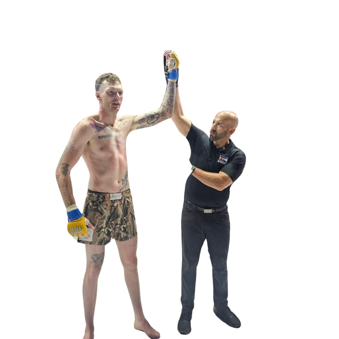 two adults sparring in martial arts
