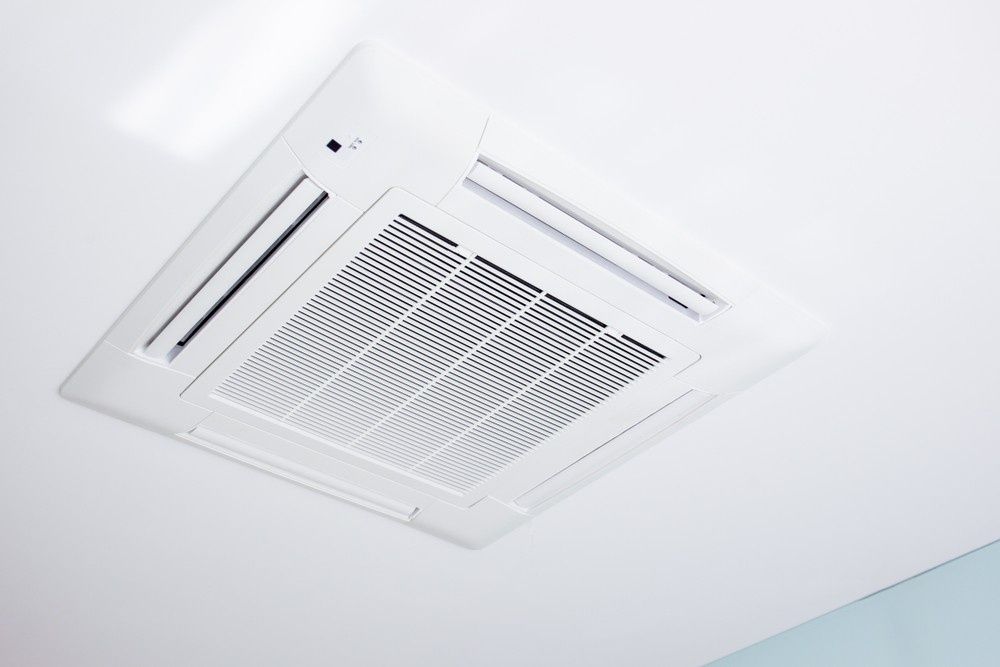 A White Ceiling Mounted Air Conditioner — Magneto HVAC in Innisfail, QLD