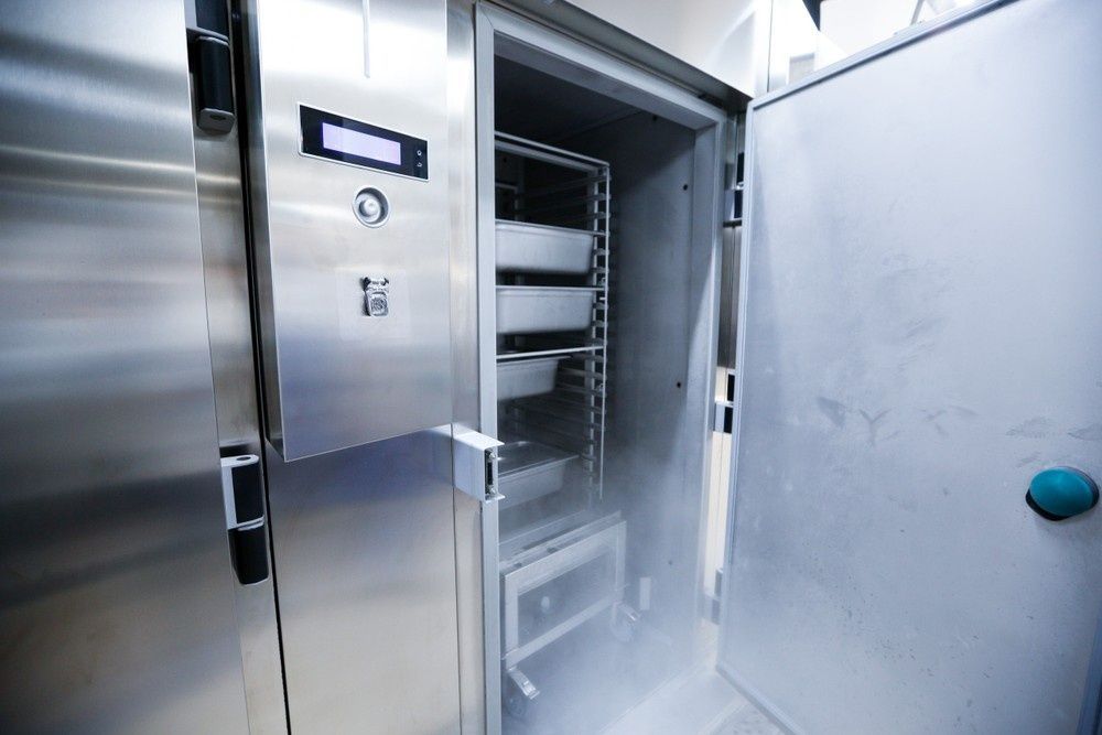 A Stainless Steel Freezer with Open Door — Magneto HVAC in Port Douglas, QLD