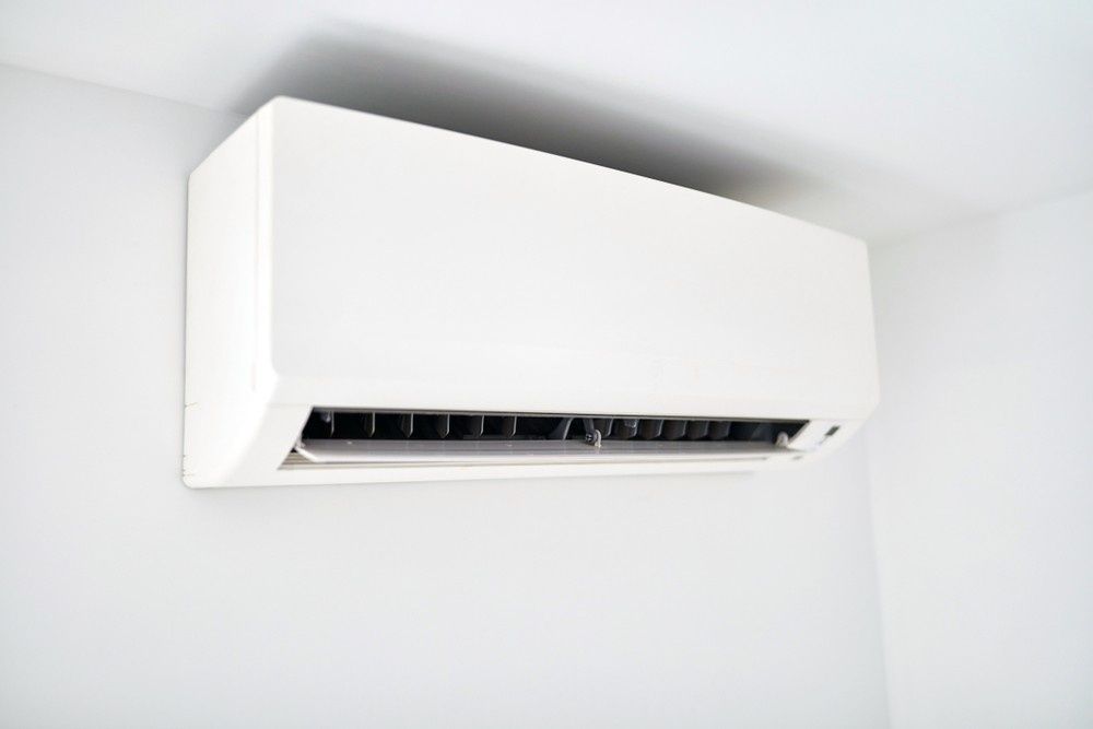 A White Wall Mounted Air Conditioning Unit — Magneto HVAC in Innisfail, QLD