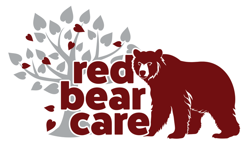 A logo for red bear care with a bear and a tree