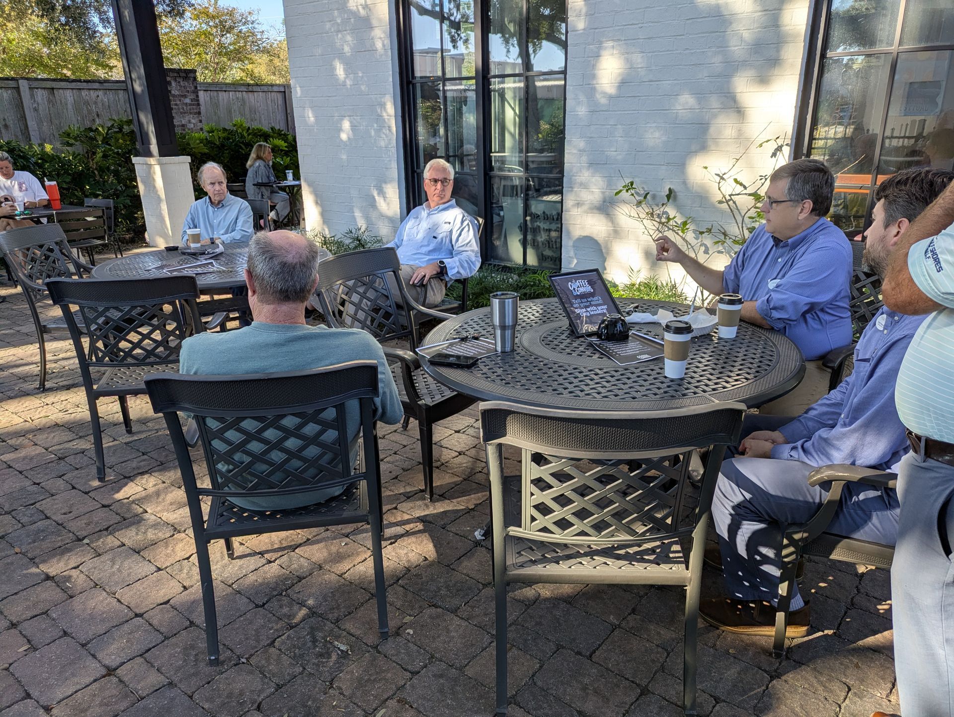Gulf Shores Mayor and city administrative leaders at Happy Pappy Coffee Shop
