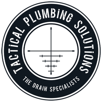 Black-and-white logo for Tactical Plumbing Solutions with &ldquo;The Drain Specialists&rdquo; and pipe graphic