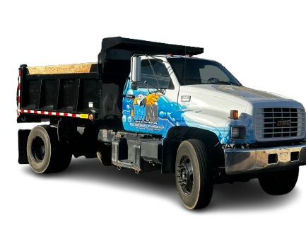 A dump truck with the word gmc on the side