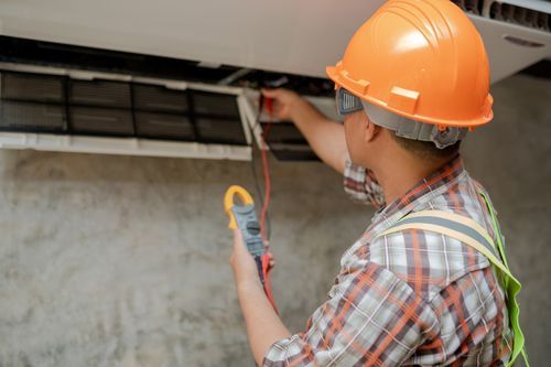 AC technician at work