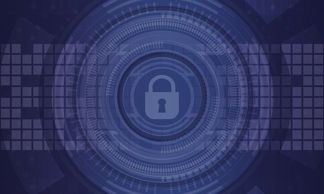 Blue digital background with a lock icon, representing cybersecurity.