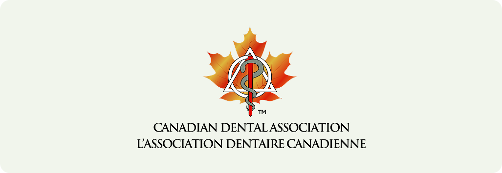The Canadian Dental Association logo features a stylized orange maple leaf behind a decorative circular emblem.