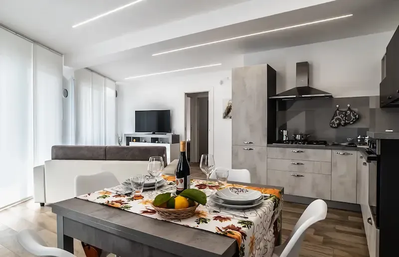 Villa Stella Polares Pozzallo modern kitchen and living room with dining area and contemporary design