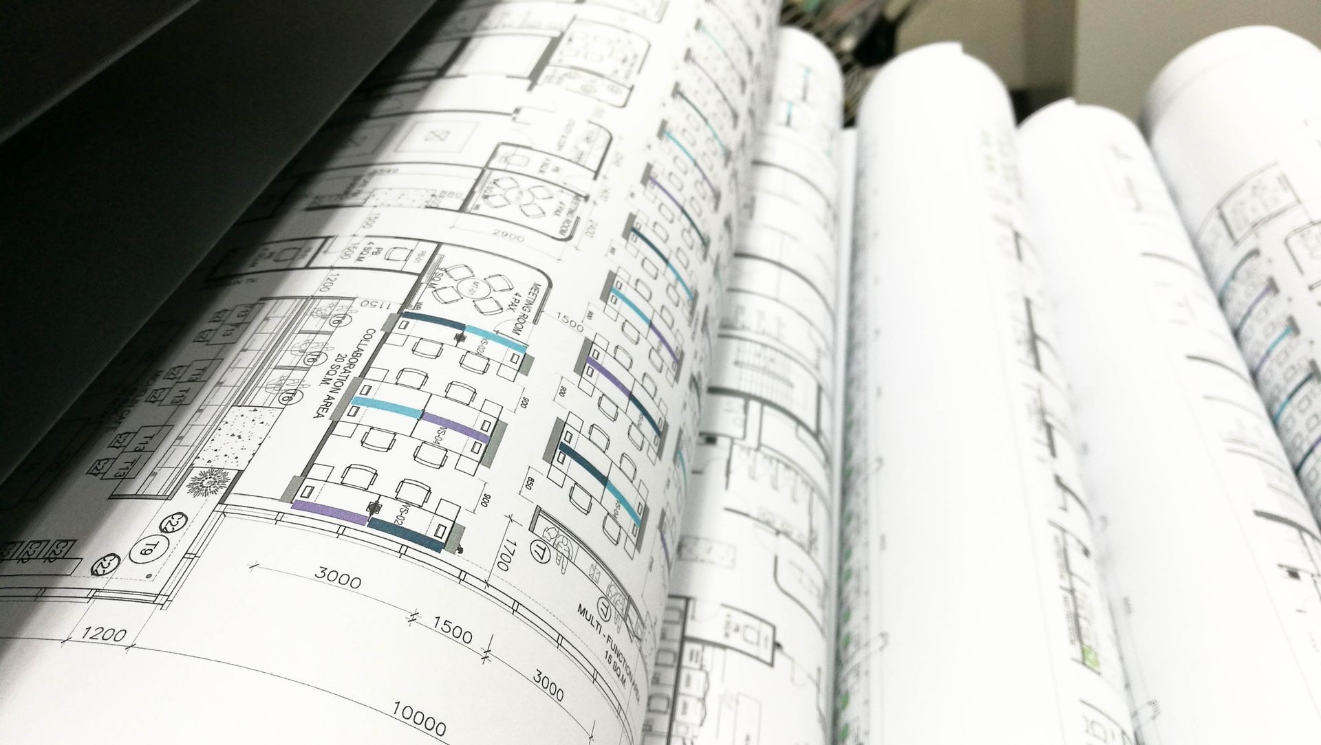 Open notebook with handwritten notes and diagrams on white pages