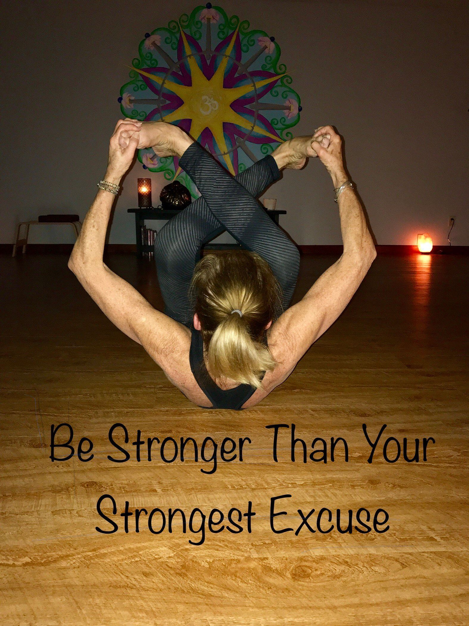 A woman is doing a yoga pose with the words be stronger than your strongest excuse