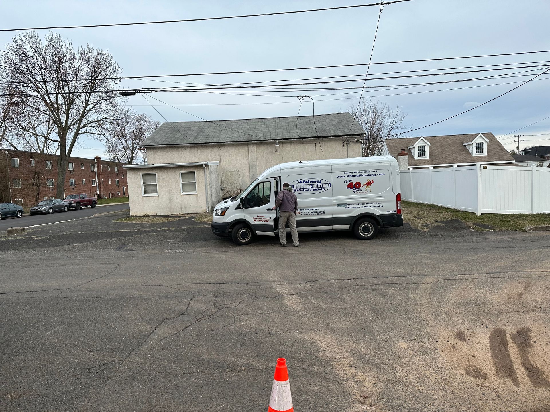 Abbey Plumbing & HVAC Truck In Font Of A House — Lansdale, PA — Abbey Plumbing & HVAC