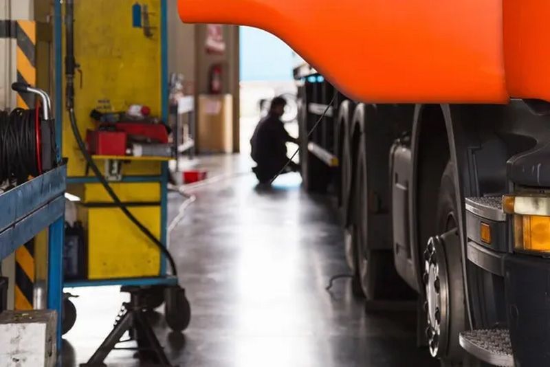 Mechanic Fixing Truck — Auto Electrical Services in Illawarra, NSW