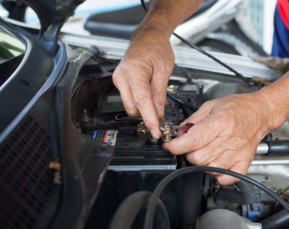 The old man' s hand is holding wrench — Auto Electrical Services in Illawarra, NSW