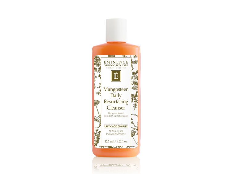 Orange bottle of Eminence Mangosteen Daily Resurfacing Cleanser with white cap.