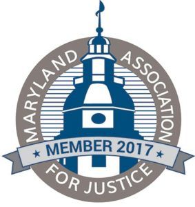 Maryland Association for Justice logo with blue courthouse tower and “Member 2017” ribbon