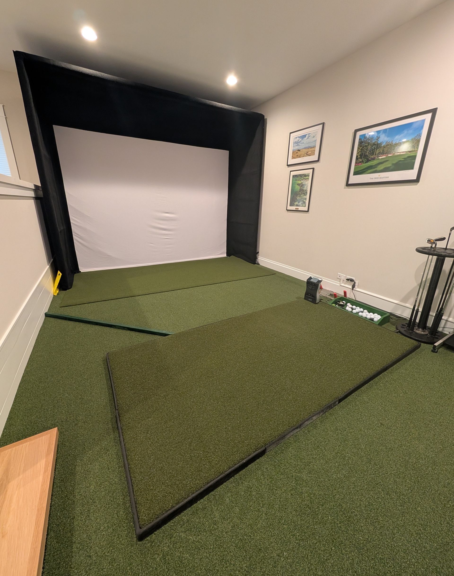 Custom golf simulator with built-in lighting in Elmhurst, Illinois. Custom rooms. Highland Park, Winnetka, Glen Ellyn.