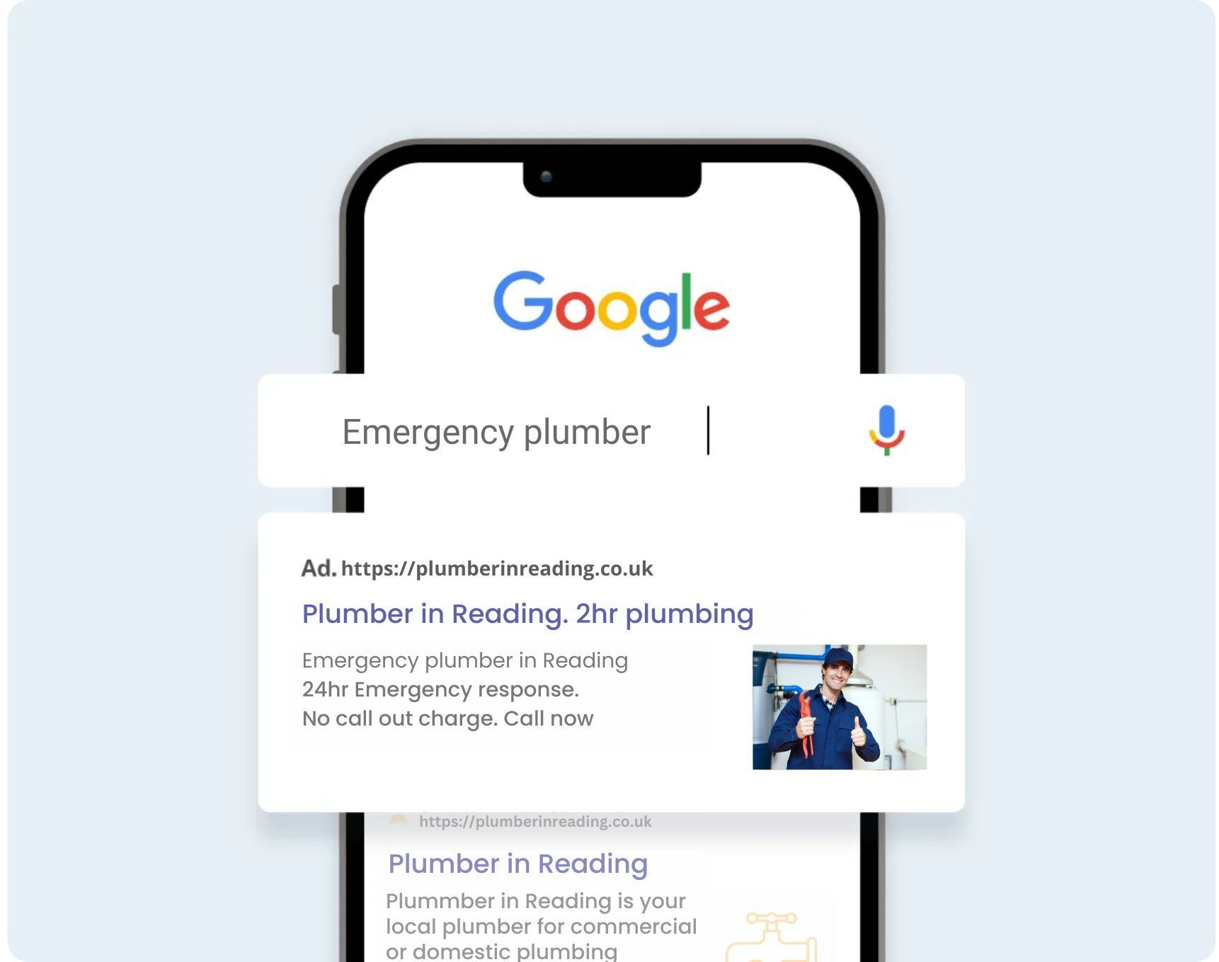 A phone is open to a google search for emergency plumber.