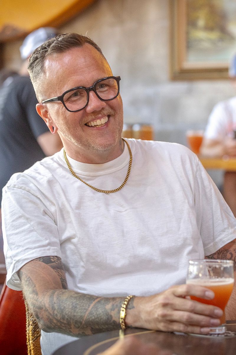 Silas Miller sharing a laugh with neighbors in Wichita