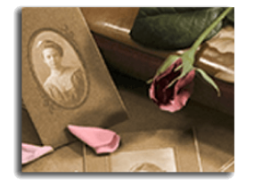 Pink rose on a book beside a small portrait and folded note on a brown surface