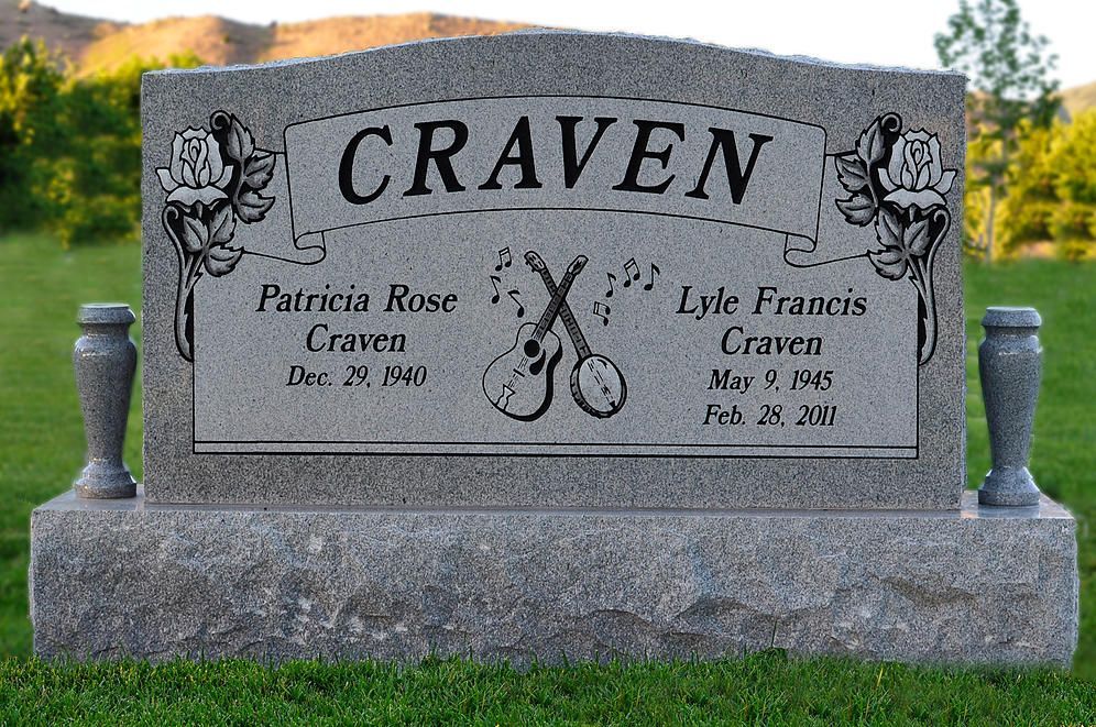 Gray granite Craven family gravestone with engraved names and decorative roses in a cemetery