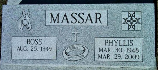 Gray gravestone for Massar with Ross and Phyllis plaques, dates, and cross emblems