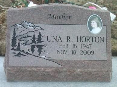 Gravestone for Una R. Horton with engraved trees and a small oval portrait.