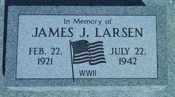Memorial plaque for James J. Larsen with dates, American flag, and WWII emblem.