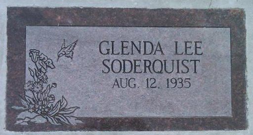 Gray gravestone for Glenda Lee Soderquist, Aug. 12, 1935, with floral engraving