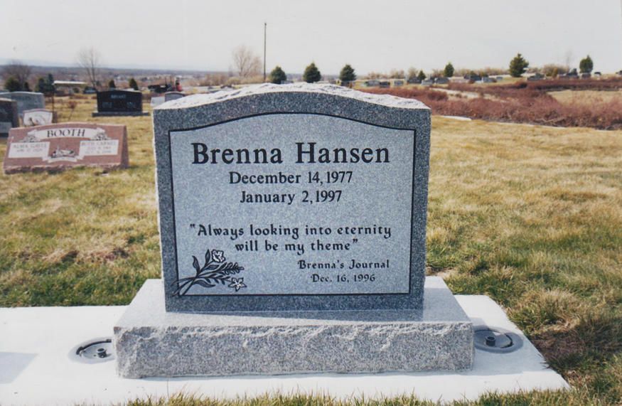 Memorial gravestone for Brenna Hansen in a cemetery, with flowers engraved at the bottom