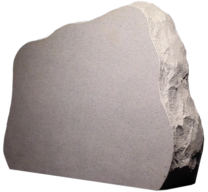 A large gray rock with a rough, jagged edge on the right side.
