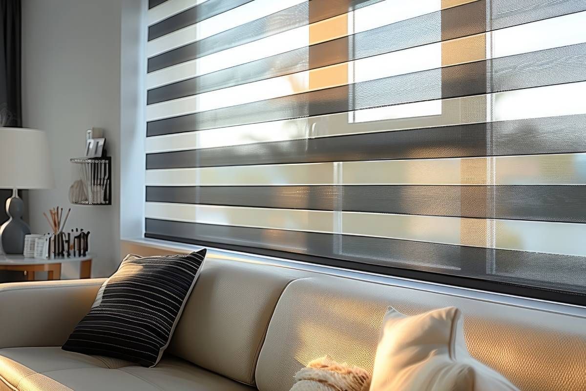 A banded window shade in a living room at Awnings, Blinds, & Shutters near Turnersville, NJ