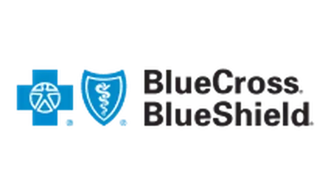 A blue cross blue shield logo with a medical cross and shield.