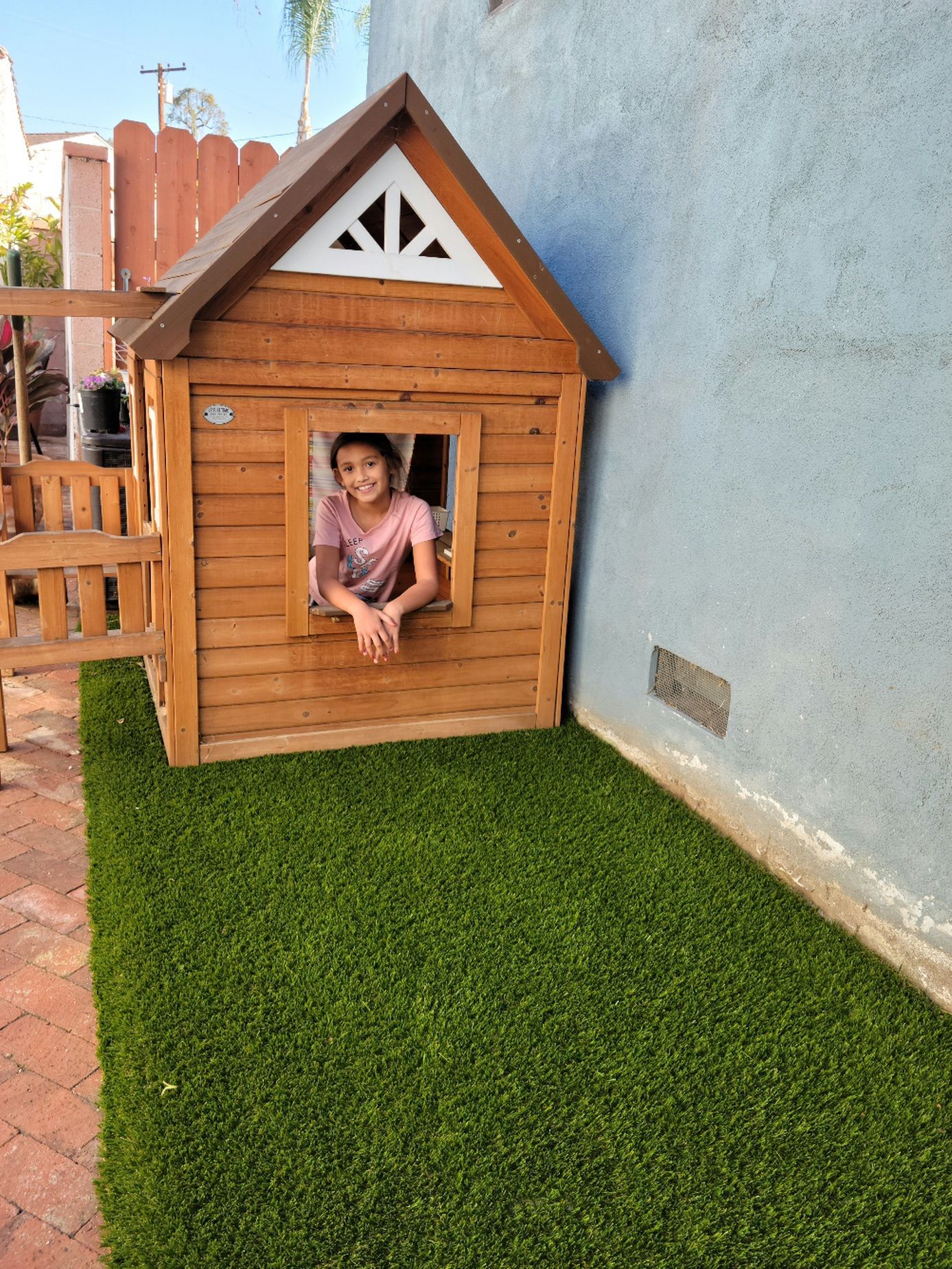 Playhouse on artificial grass in Whittier