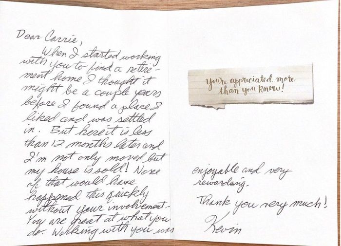 Handwritten note on white paper with a small taped message and a few lines signed “Bon.”