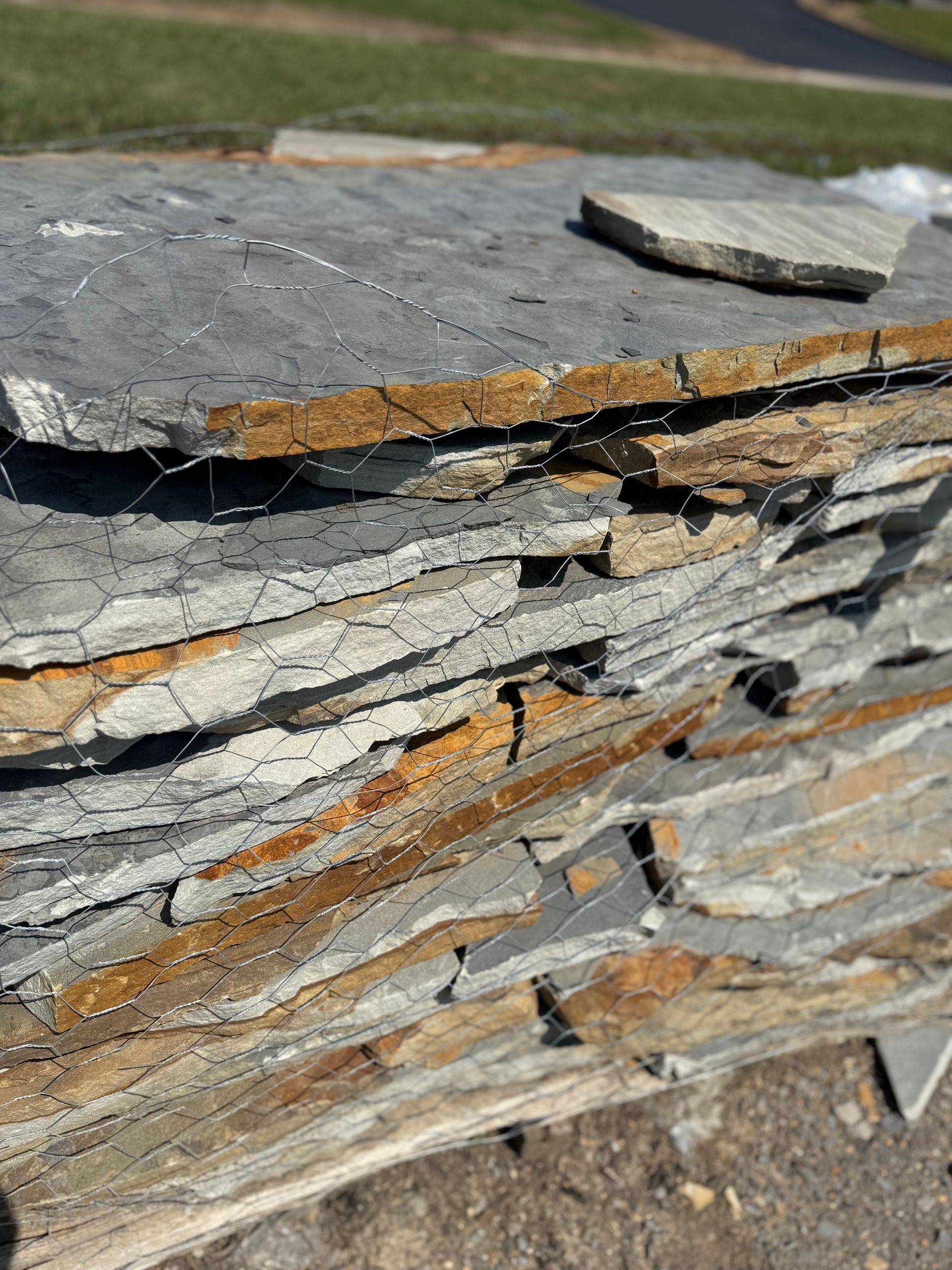 A pile of rocks sitting on top of each other on a table.