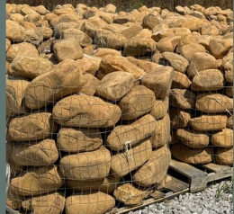 A pile of rocks sitting on top of each other on a table.