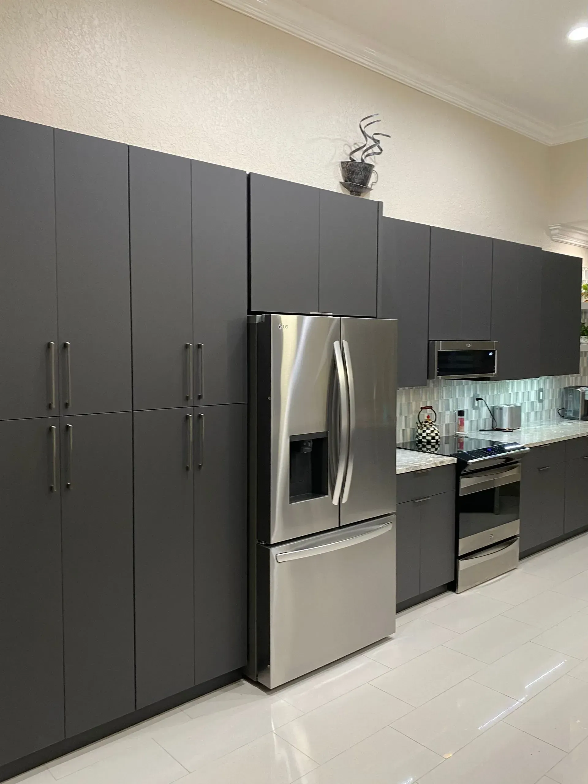 Refacing kitchen cabinets in Matte Gray with white quartz countertop | Cooper City, FL