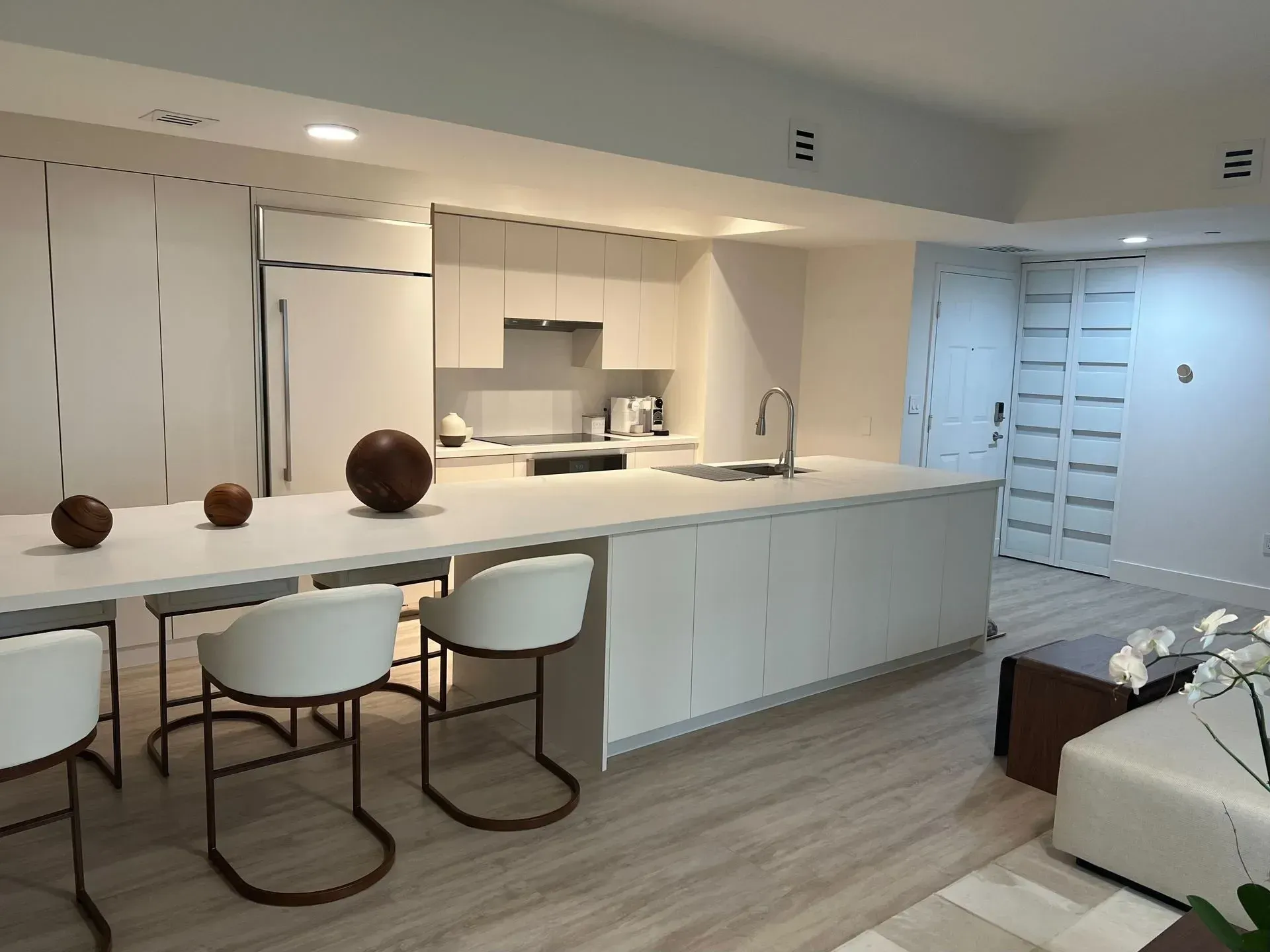 Large kitchen with Island, finished in matte white | Coral Gables, FL