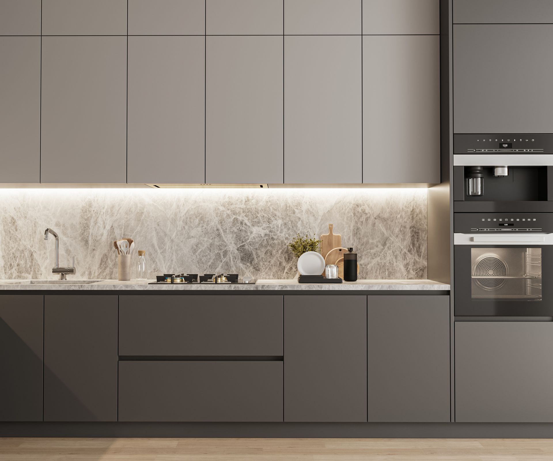 A kitchen with stainless steel appliances and white cabinets.