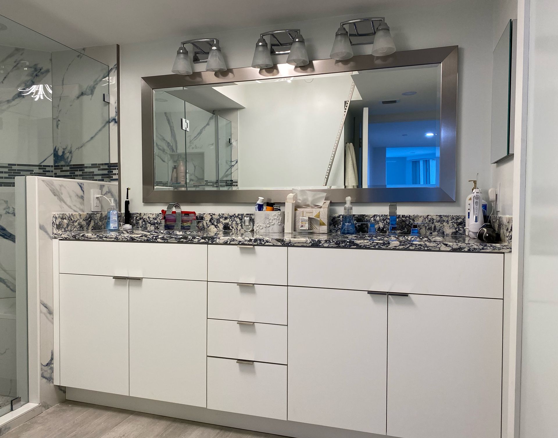 Custom vanity with double sink and a large mirror