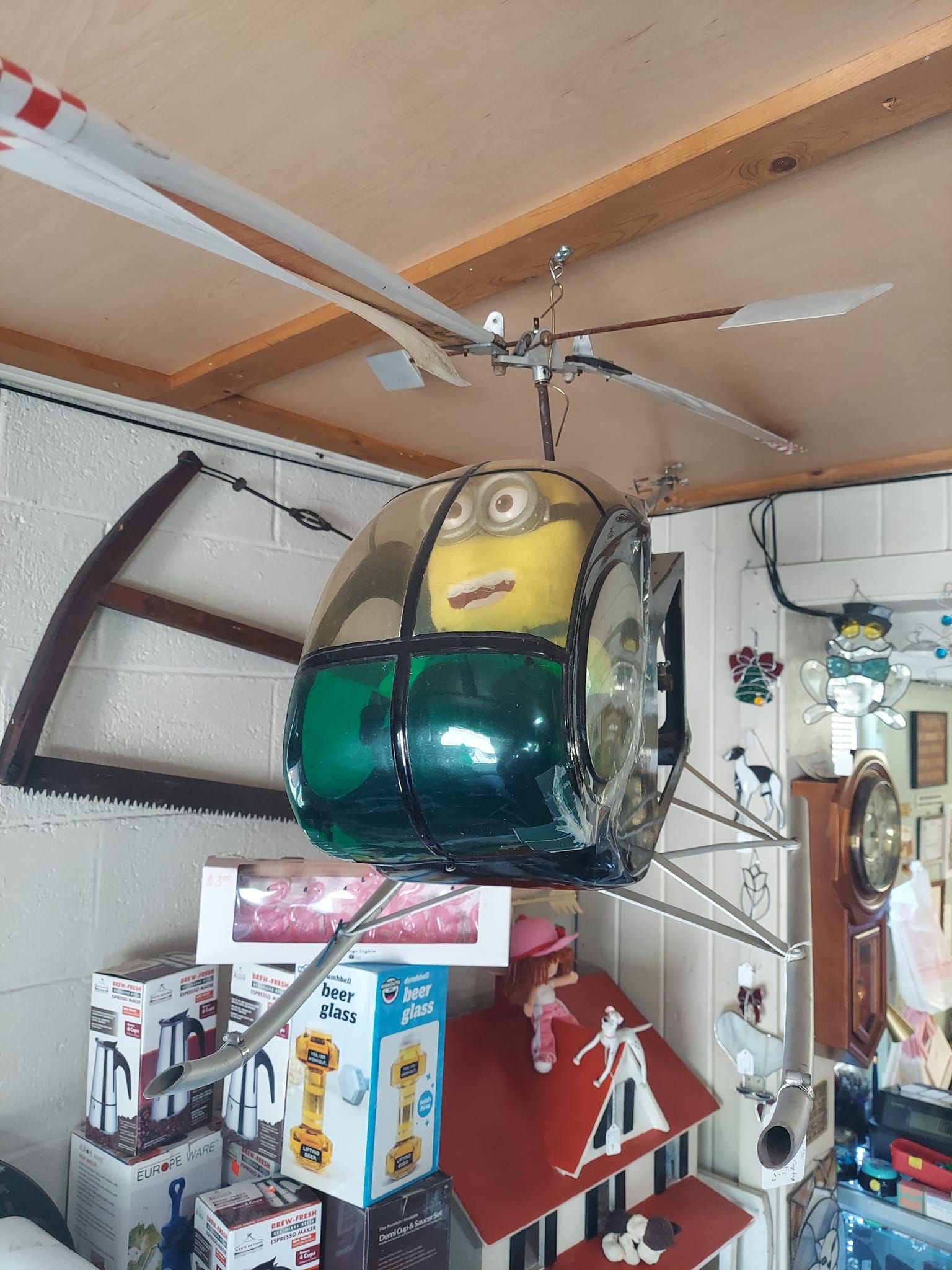 A toy helicopter with a minion inside of it