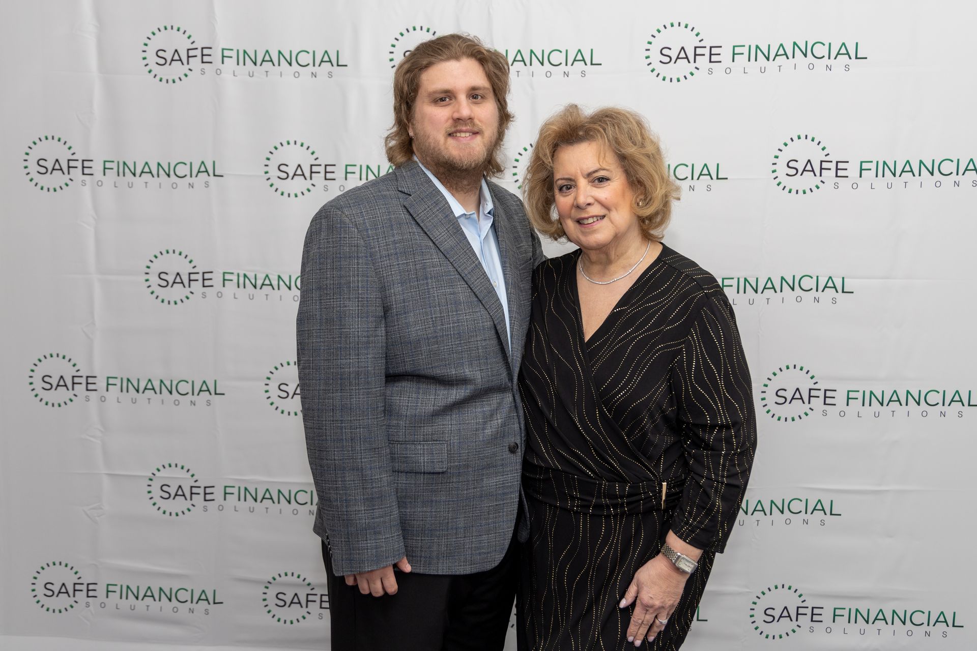 One woman and One men smiling