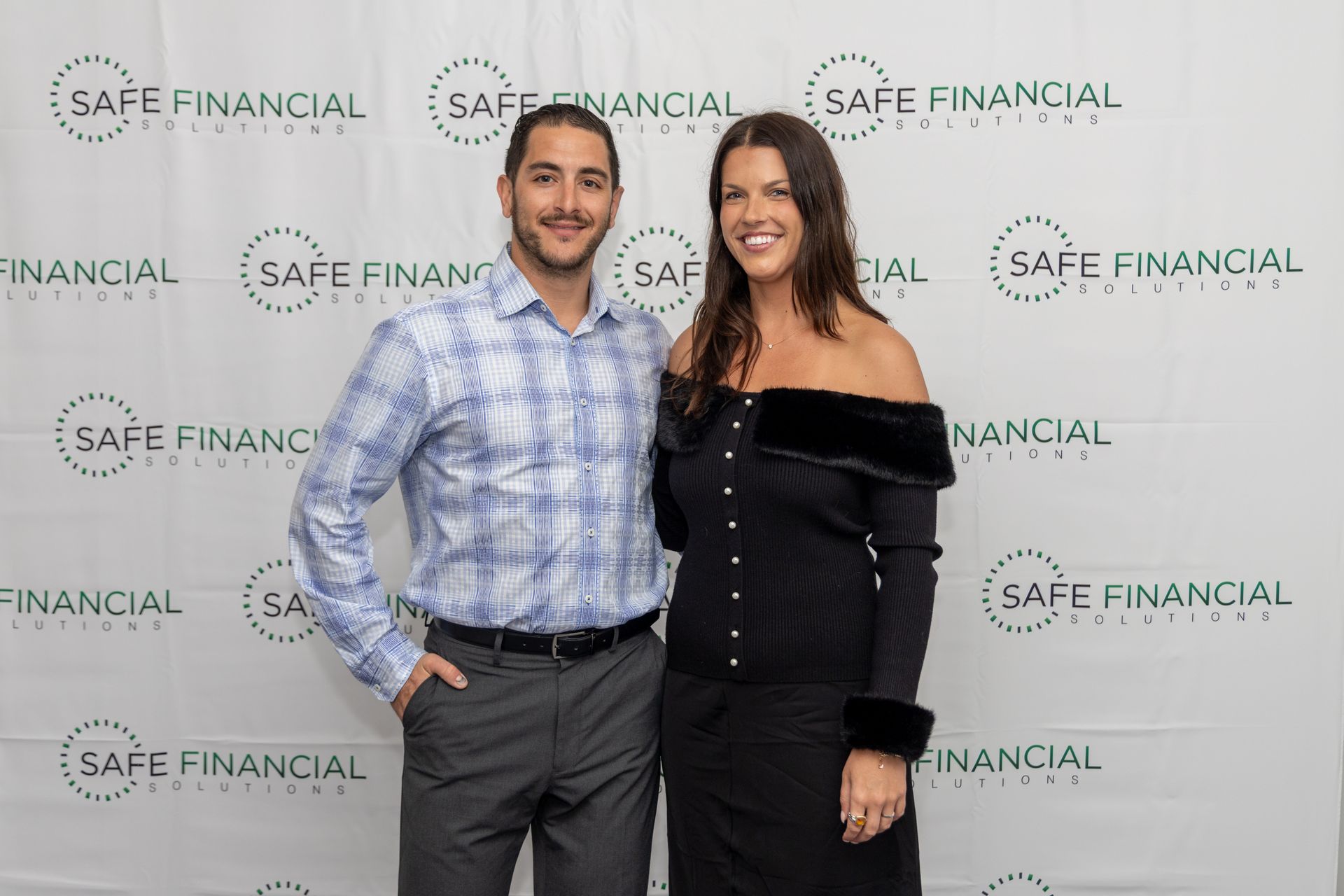 One woman and One men smiling