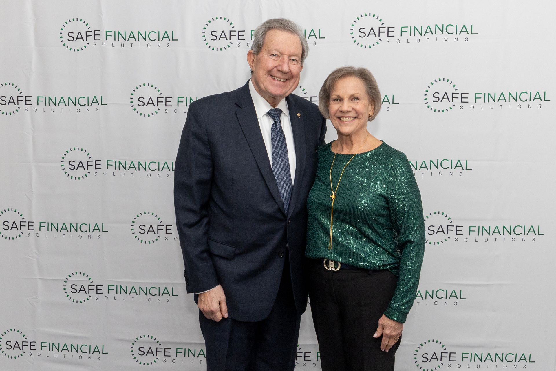 One woman and One men smiling