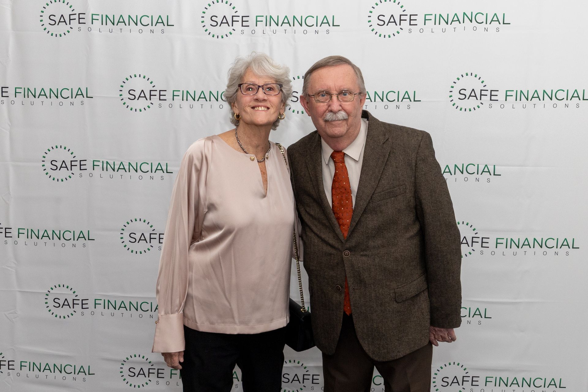 One woman and One men smiling