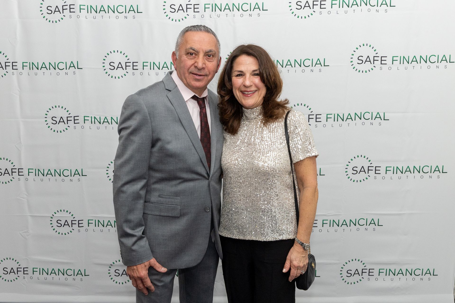 One woman and One men smiling