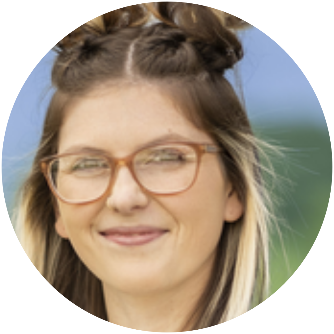 A woman wearing glasses is smiling in a circle