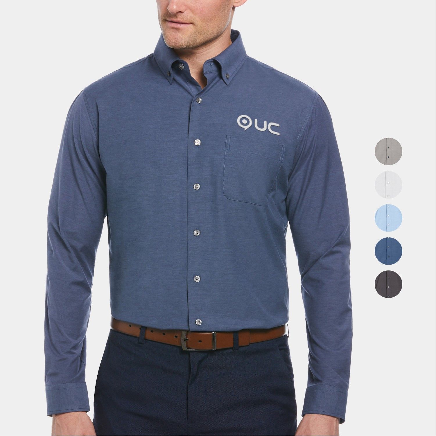 A man wearing a blue shirt with the word ouc on it