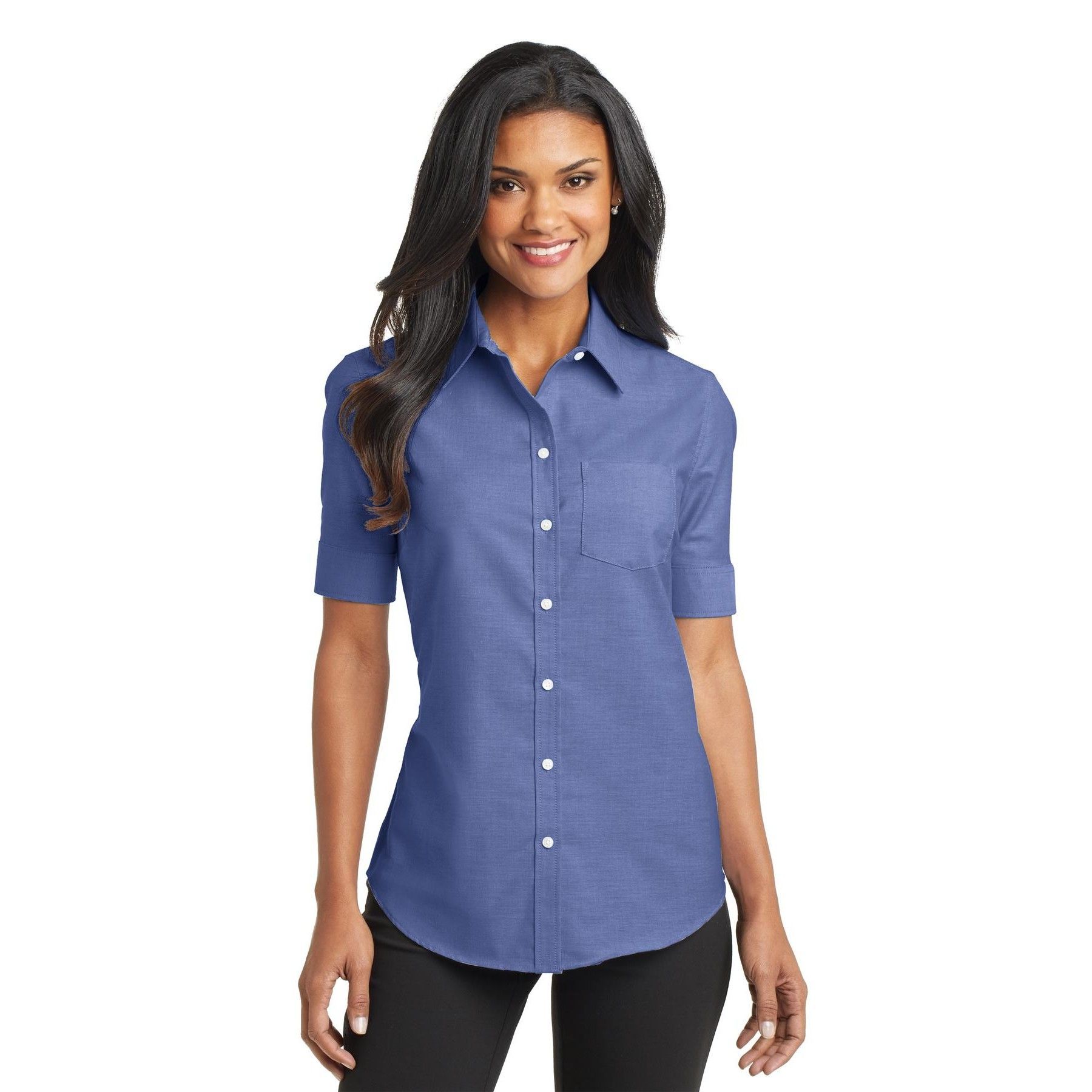A woman is wearing a blue shirt and black pants.