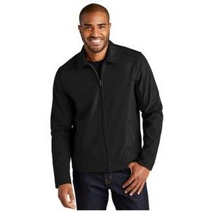 A man is wearing a black jacket and jeans.